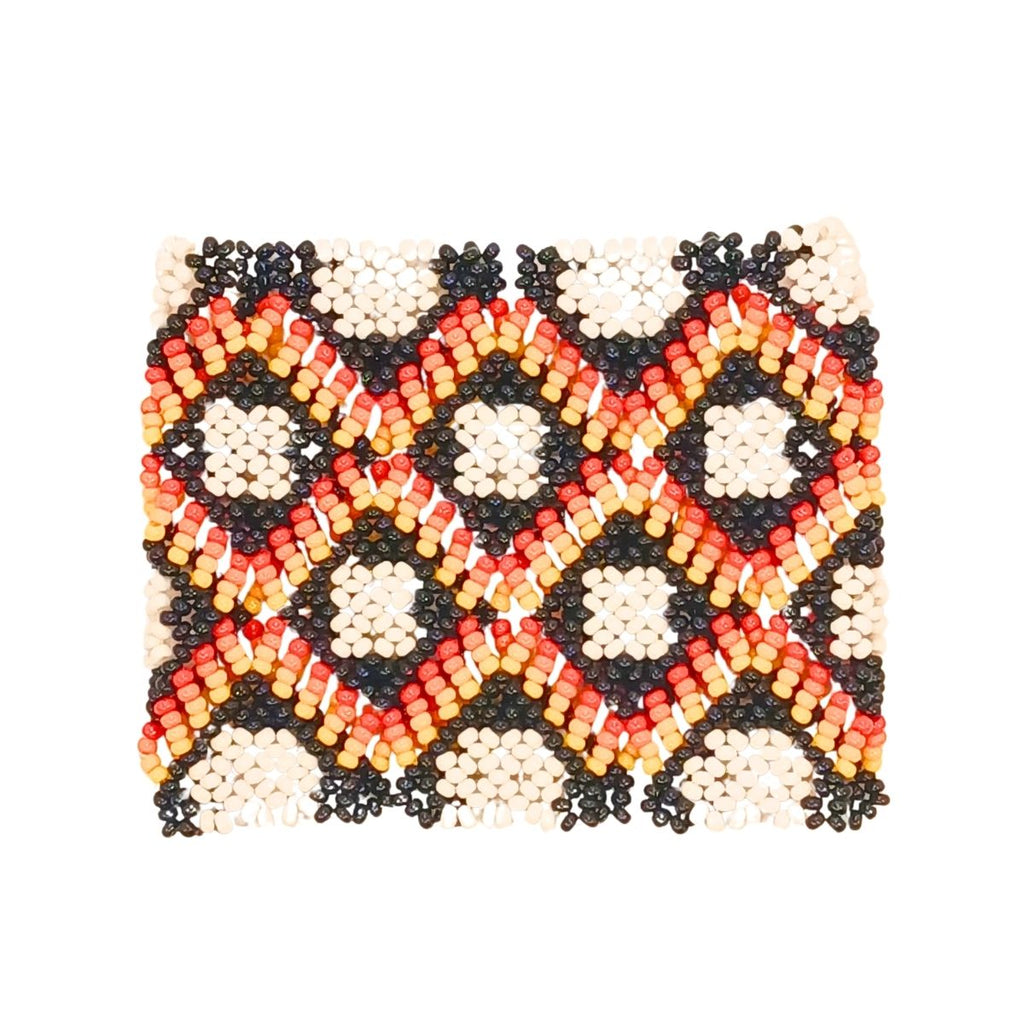 Pulseira de miçangas preta com motivos em flor branco e vermelho/laranja